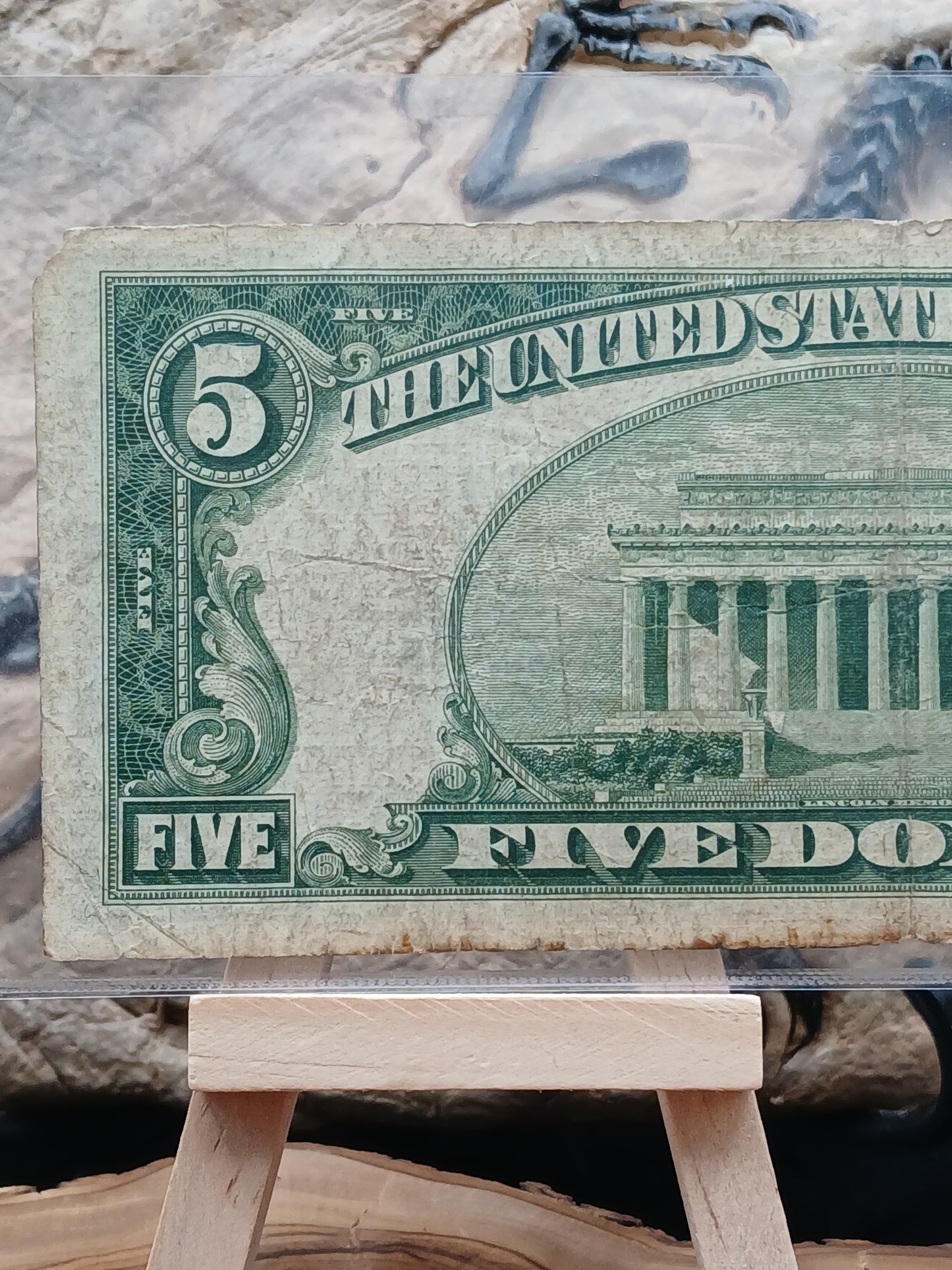 5 American dollars . 1953