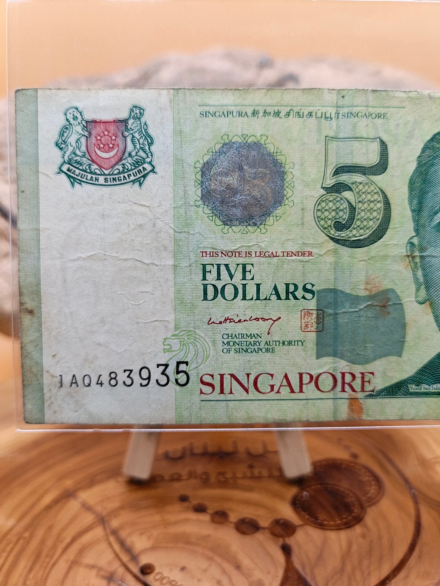 5 dollars . Singapore 2007