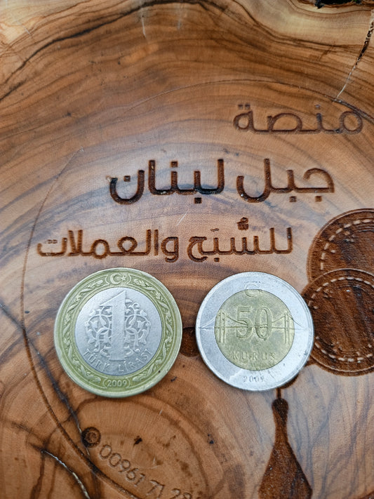 1 lira & 50 kurus . Turkey . 2009