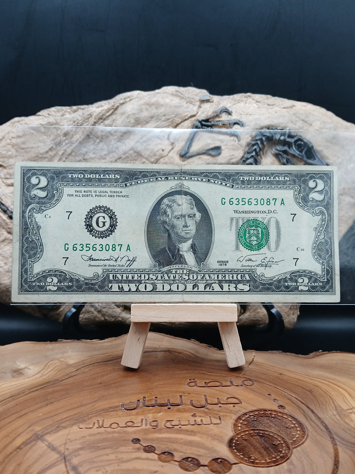 2  American dollars . 1976