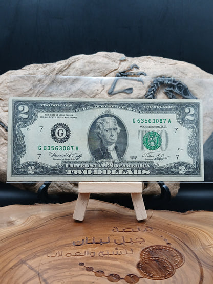 2  American dollars . 1976