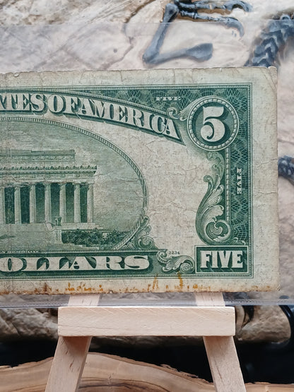 5 American dollars .  1953