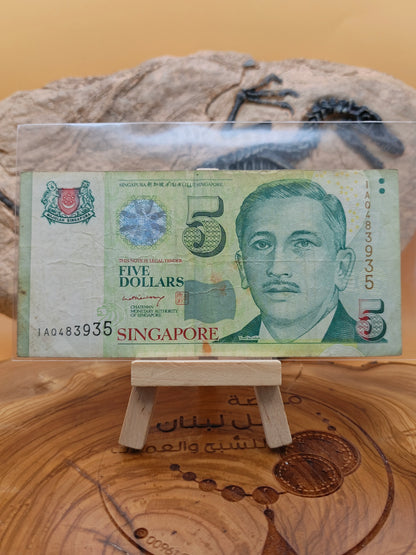 5 dollars . Singapore 2007
