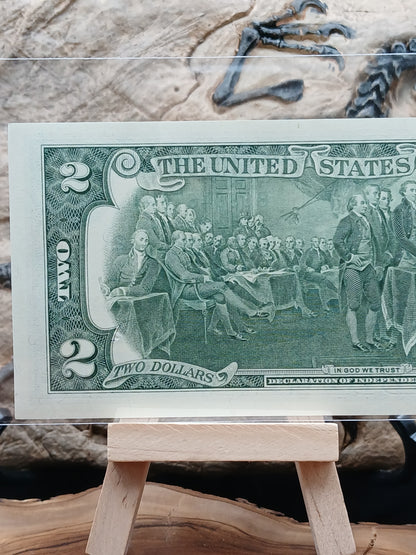 2 American dollars . 2013