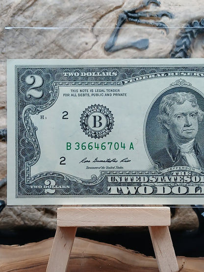 2 American dollars . 2013