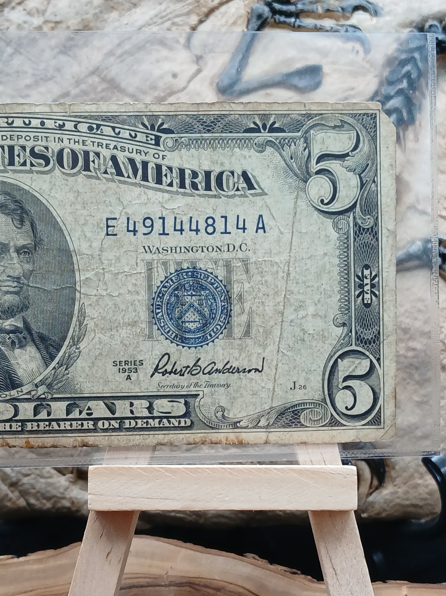5 American dollars .  1953
