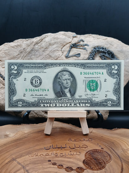 2 American dollars . 2013