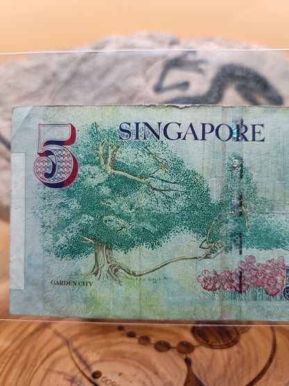 5 dollars . Singapore 2007