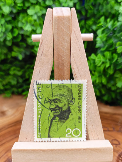 Collection of 65 mixed foreign postage stamps from different countries around the world.