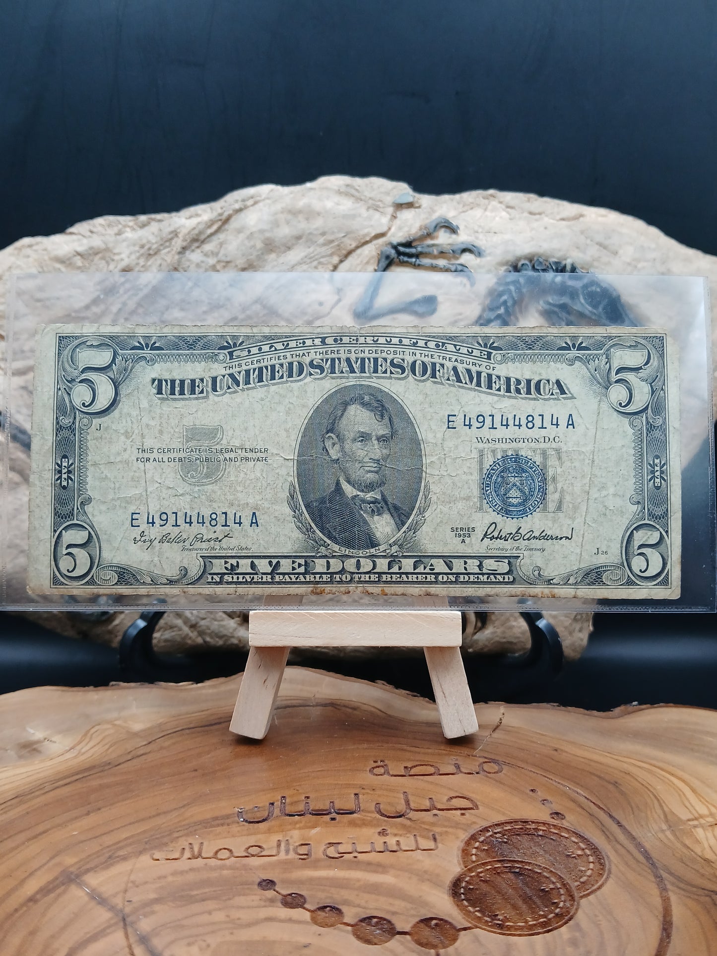 5 American dollars .  1953