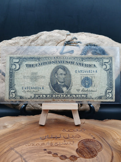 5 American dollars .  1953