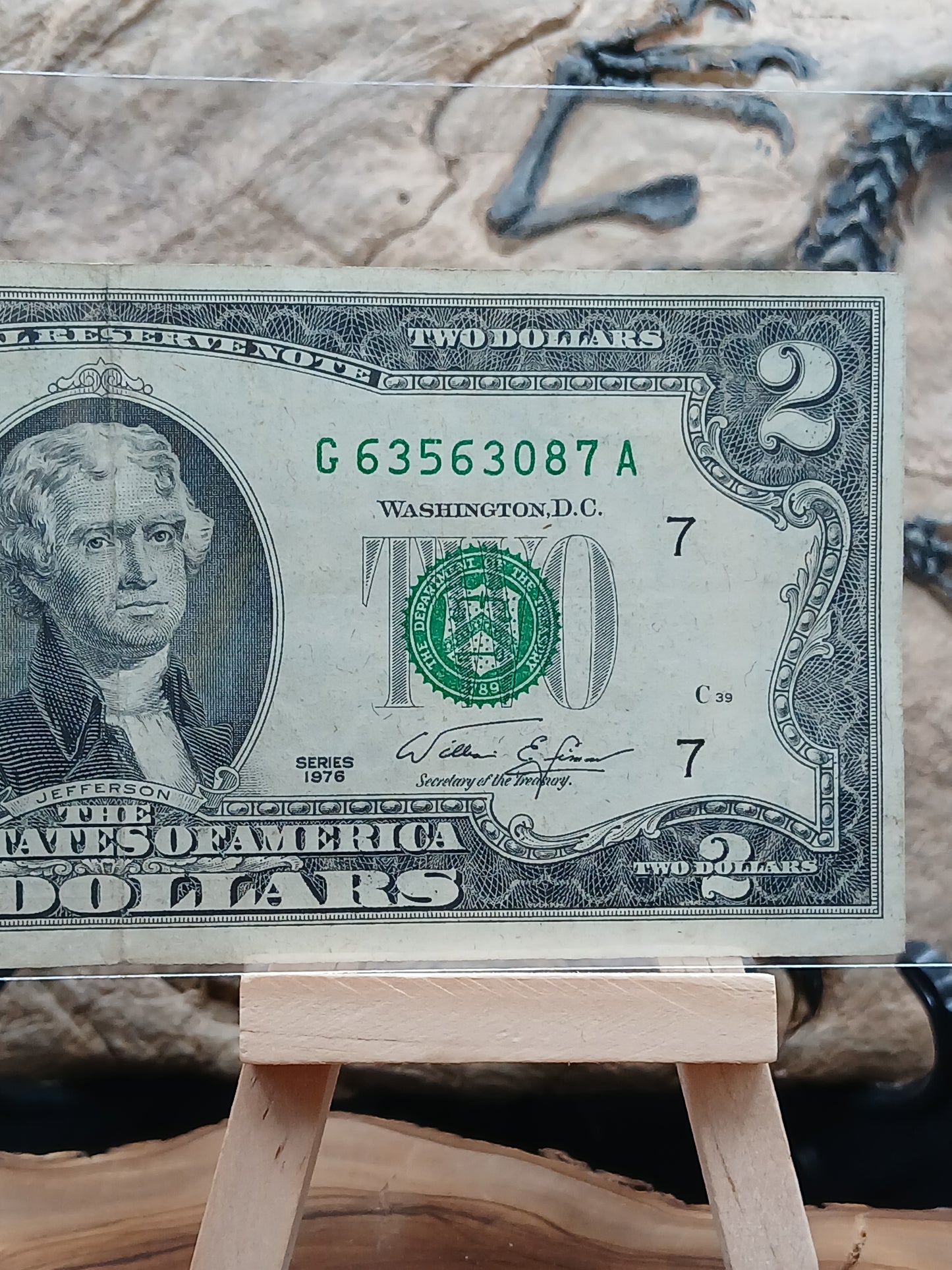 2  American dollars . 1976
