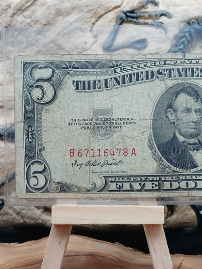 5 American dollars . 1953
