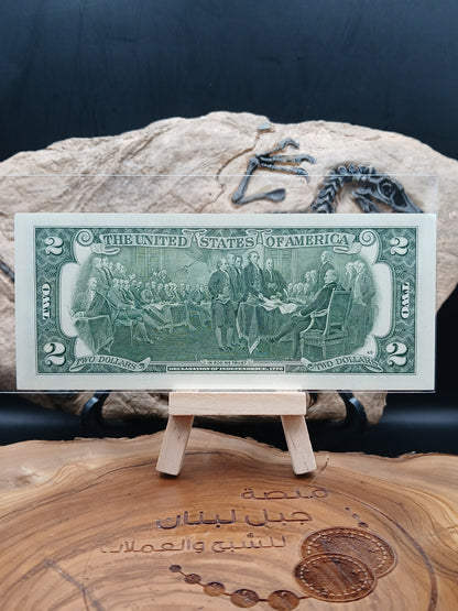 2 American dollars . 2013