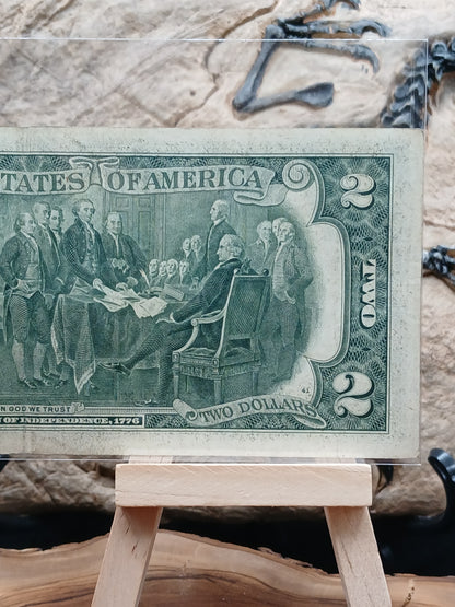 2  American dollars . 1976