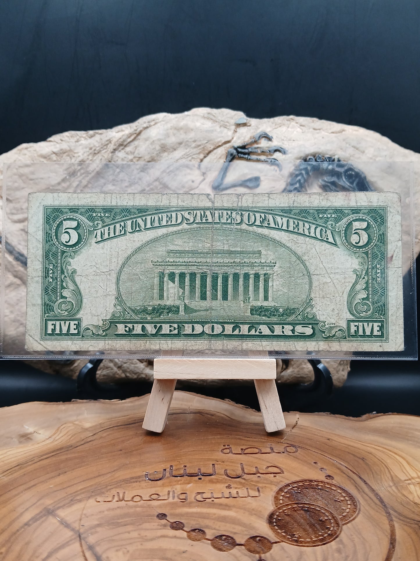 5 American dollars . 1953