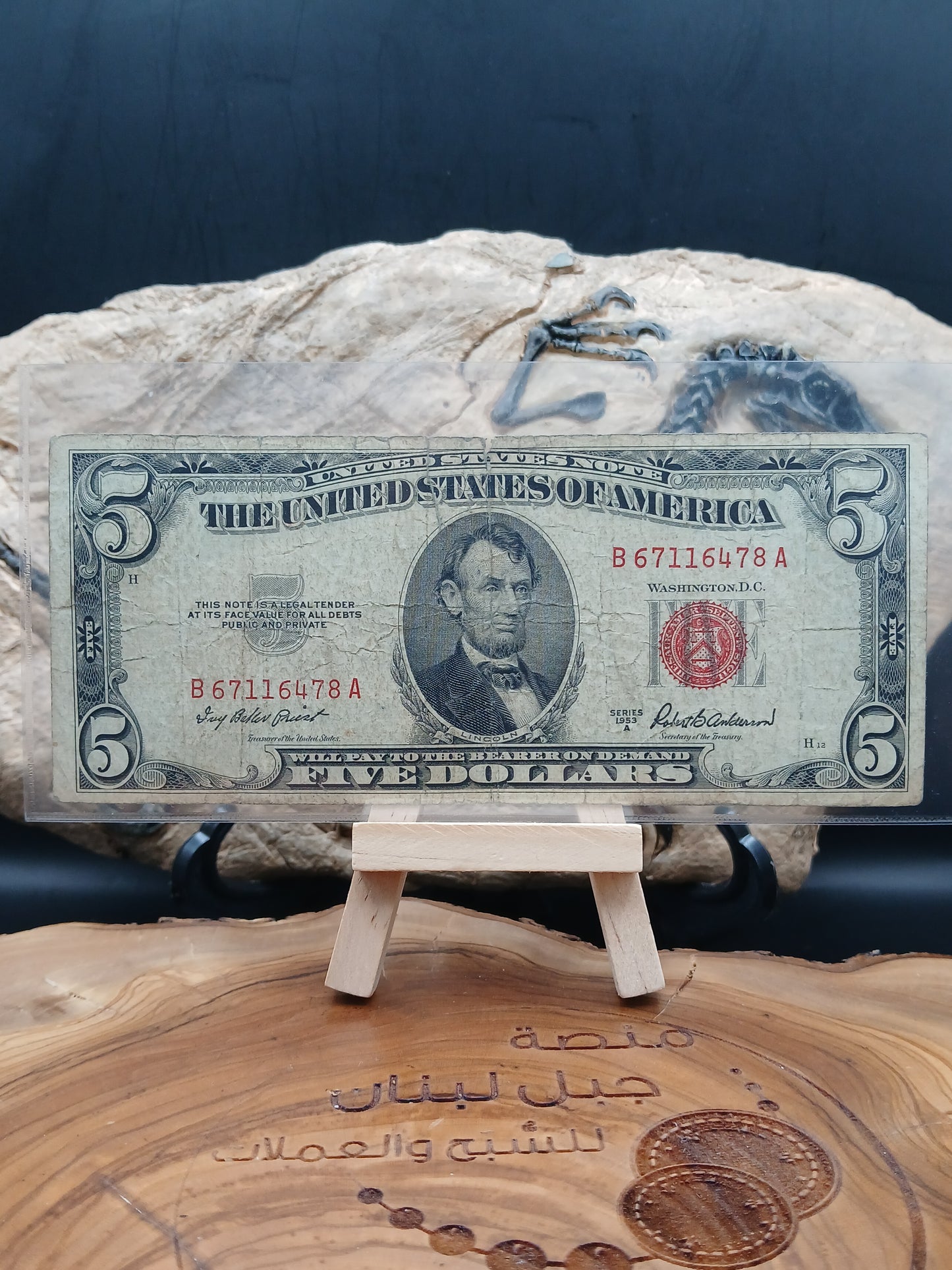 5 American dollars . 1953