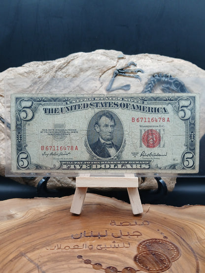 5 American dollars . 1953
