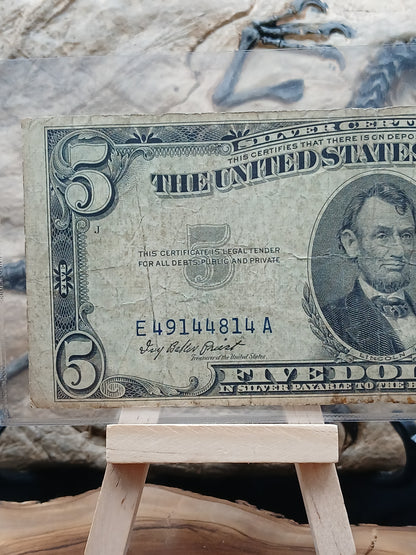 5 American dollars .  1953