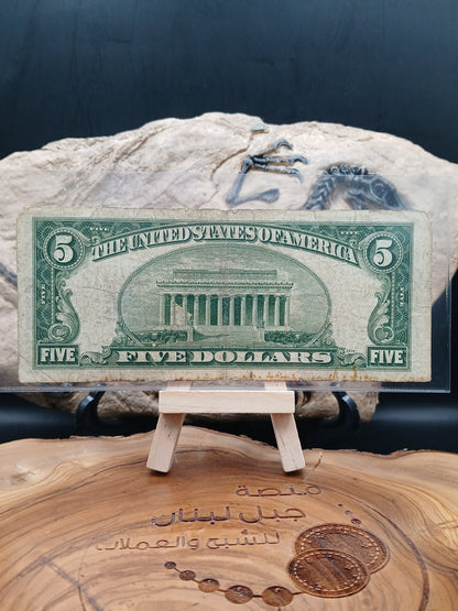 5 American dollars .  1953