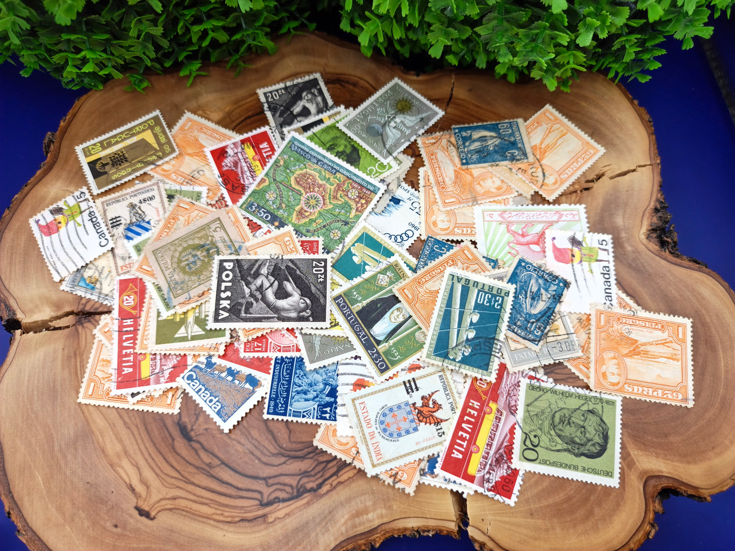 Collection of 65 mixed foreign postage stamps from different countries around the world.