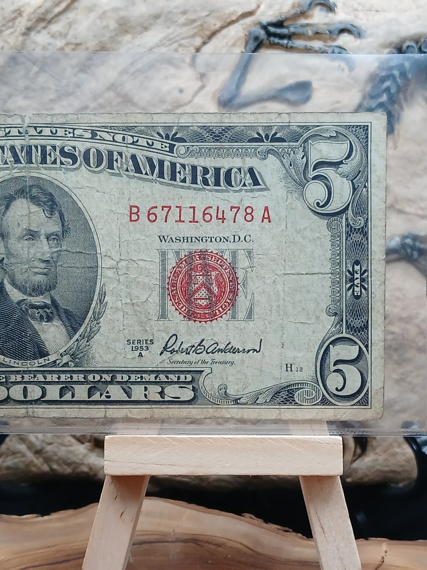 5 American dollars . 1953