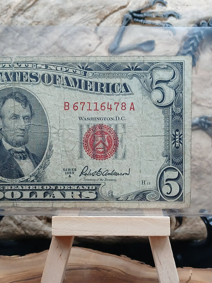 5 American dollars . 1953
