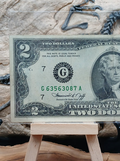 2  American dollars . 1976